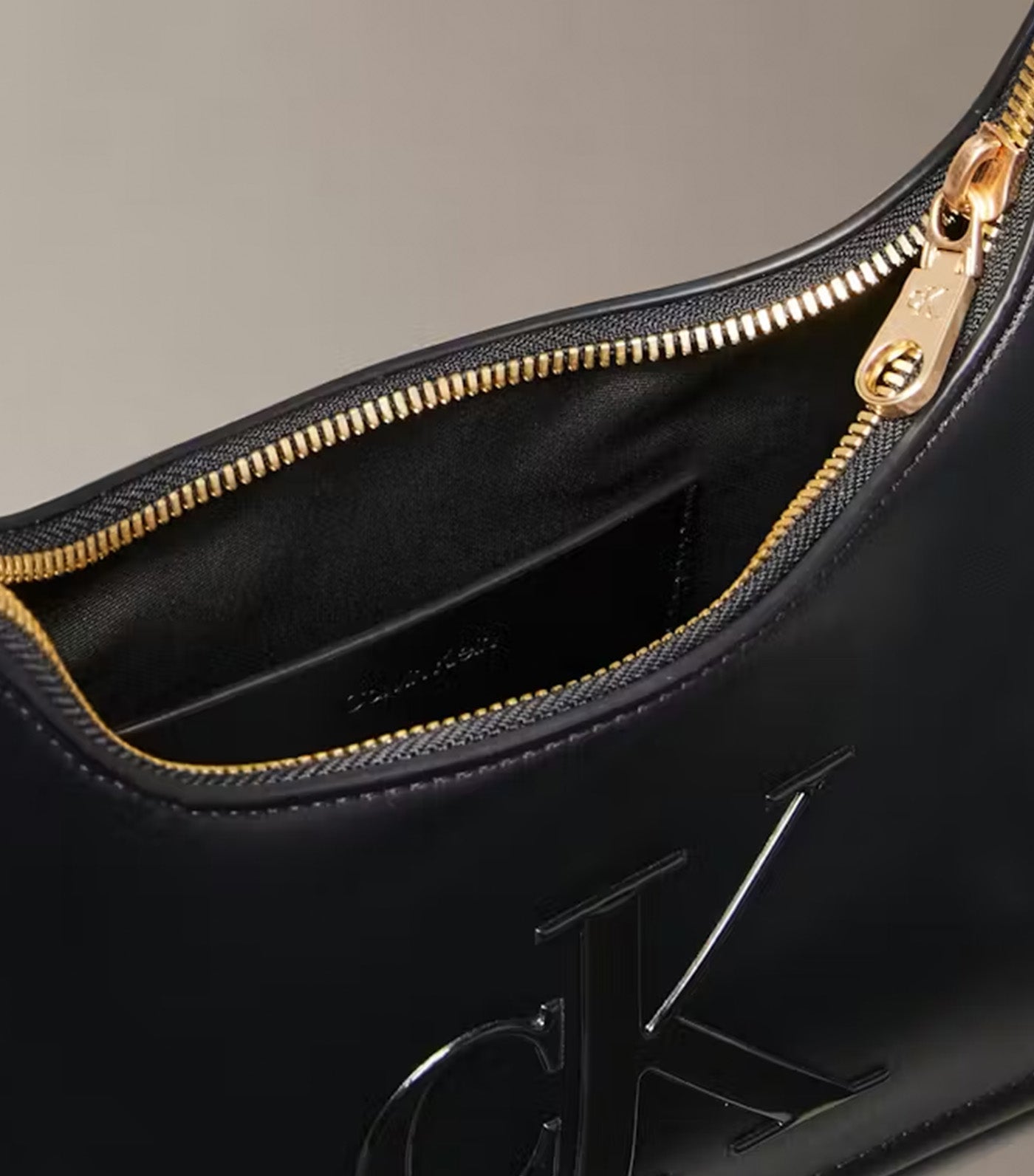 Embossed Monogram Shoulder Bag