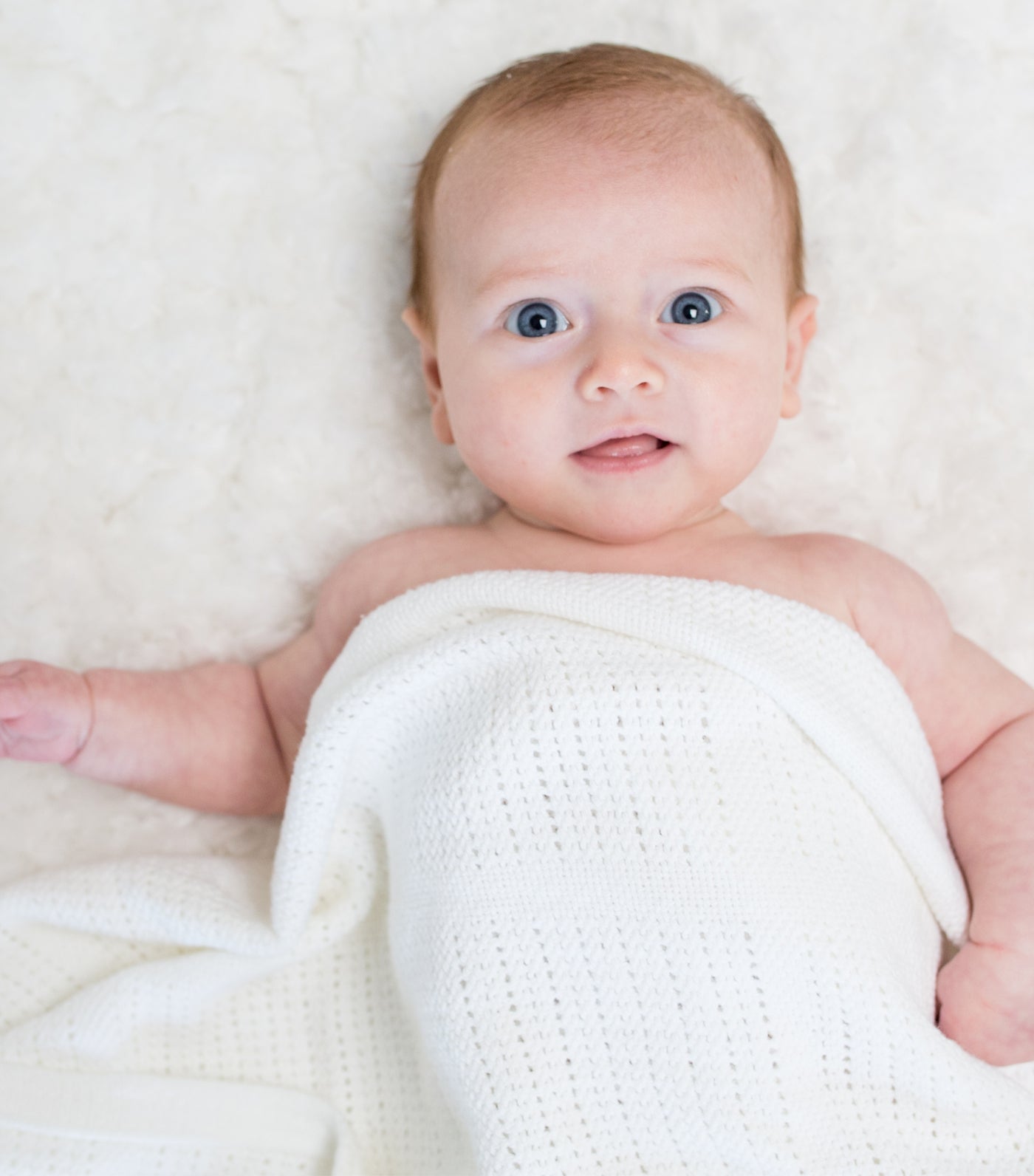 lulujo white cellular cotton baby blanket