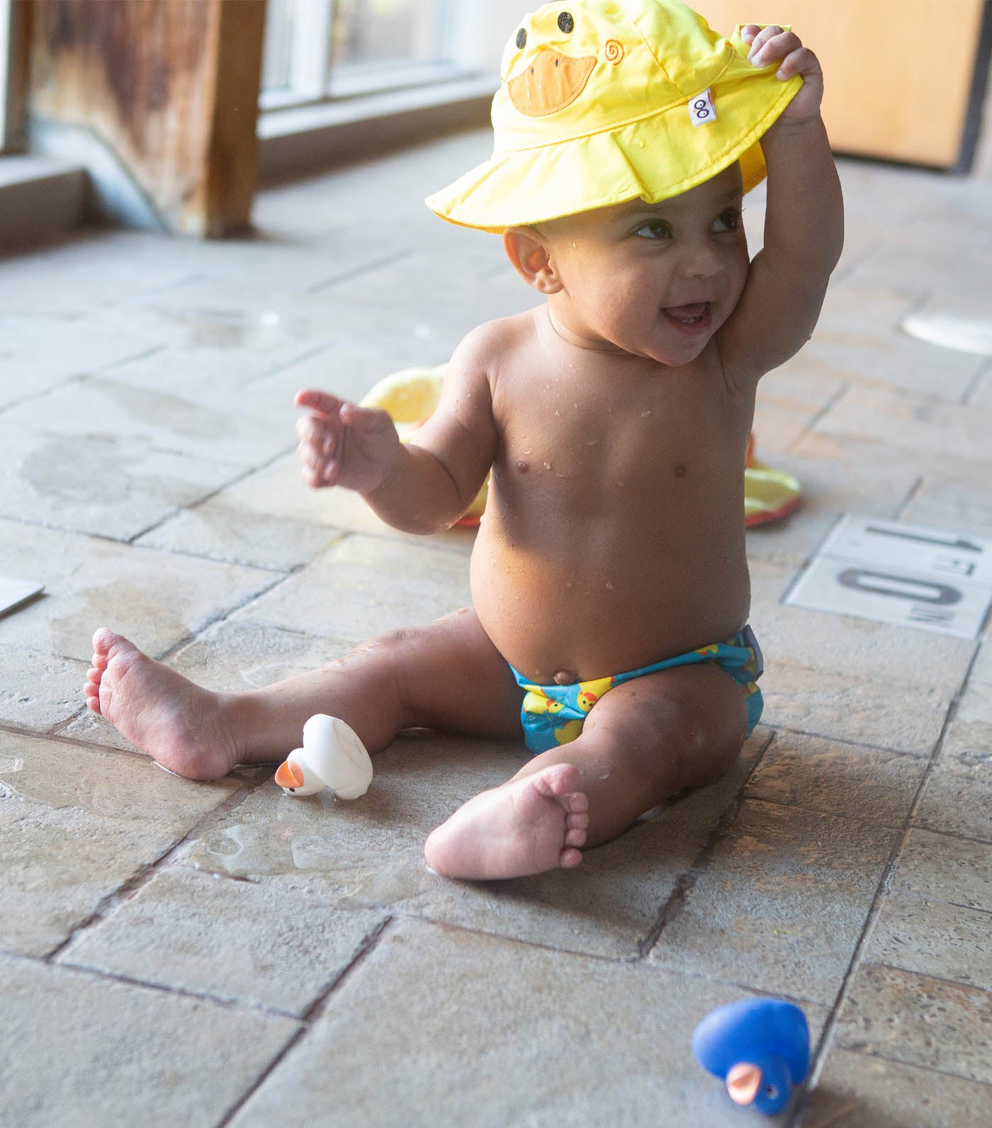 lulujo up50+ yellow and blue baby swim diaper and sun hat set - puddles the duck