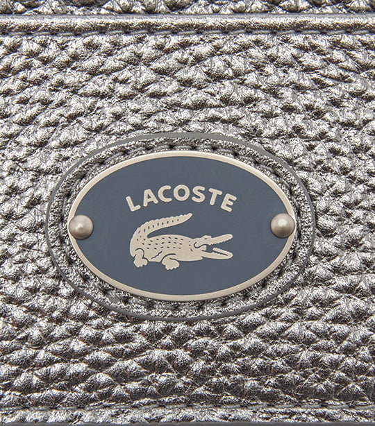 Lacoste metal clearance logo