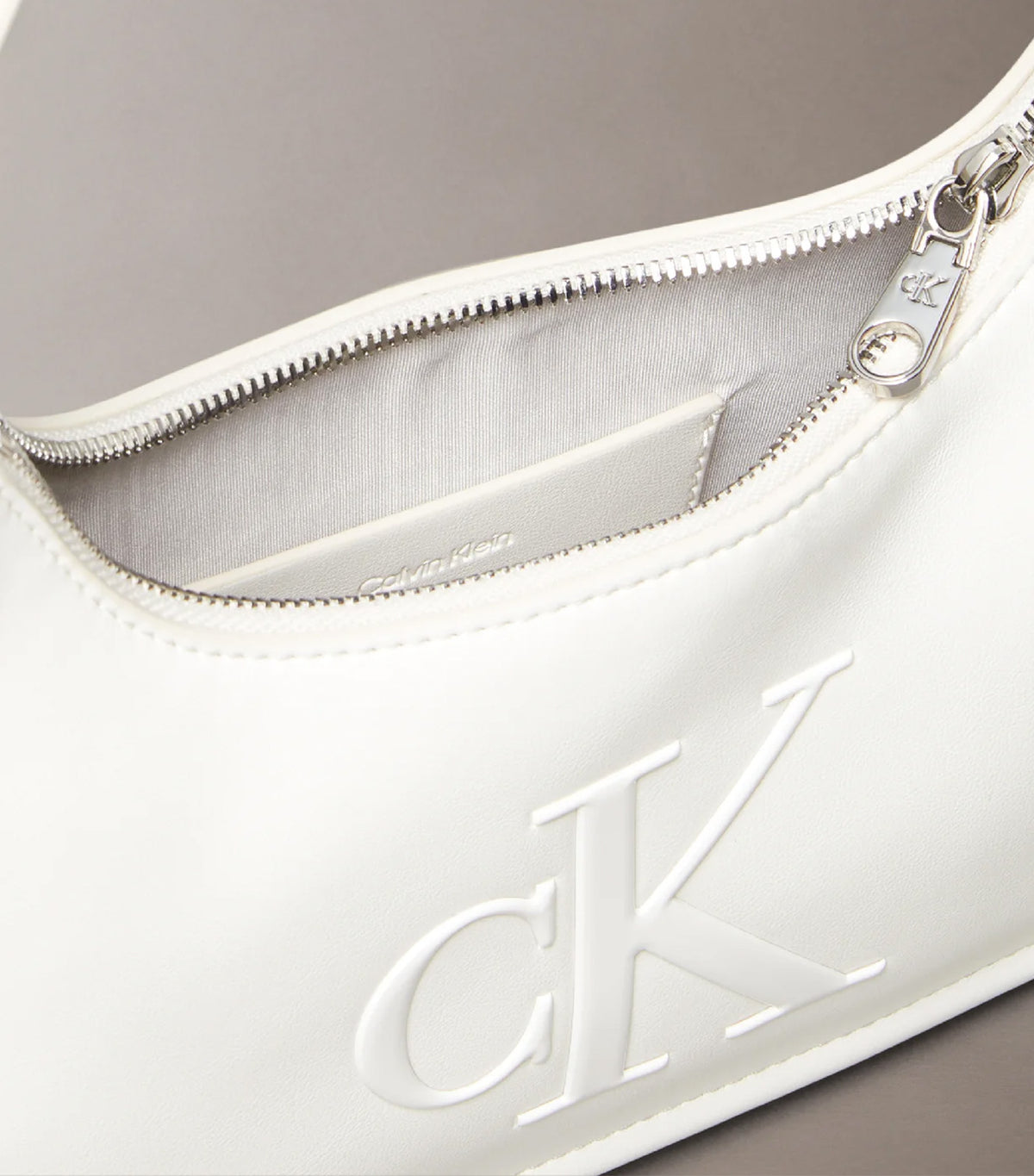 Embossed Monogram Shoulder Bag