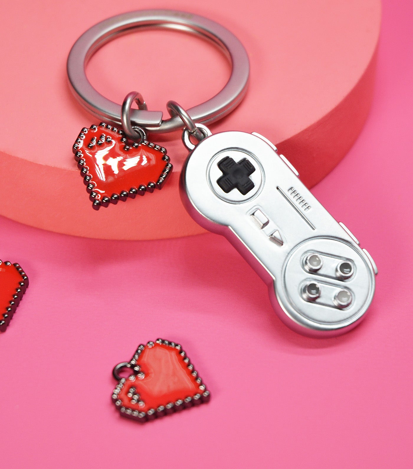 Meta[l]morphose Game Keyring