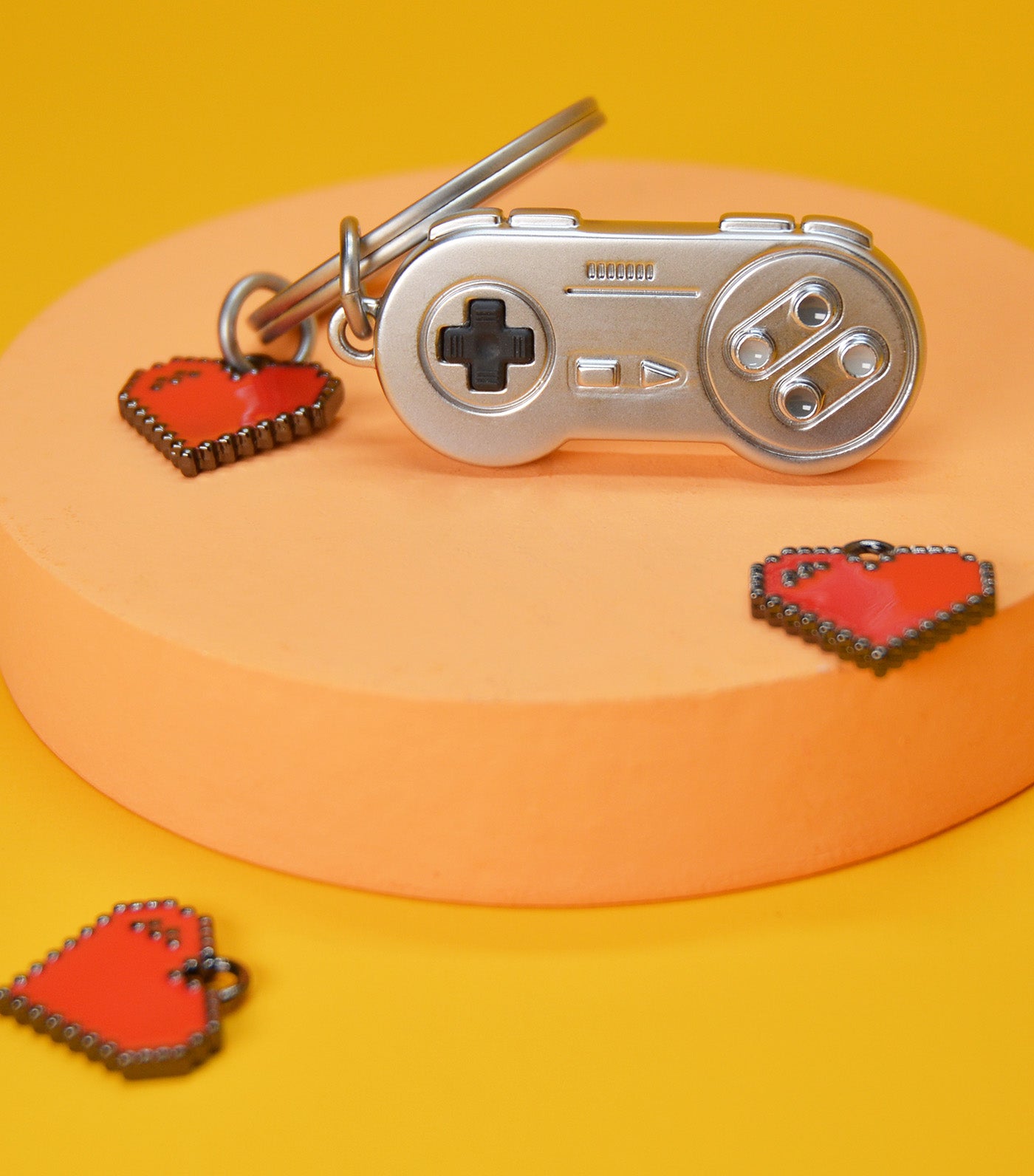 Meta[l]morphose Game Keyring