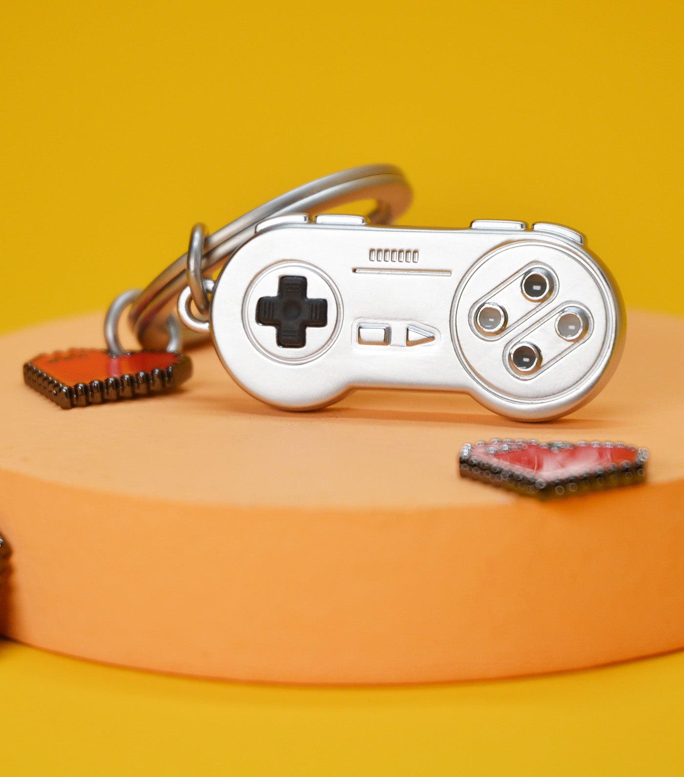 Meta[l]morphose Game Keyring