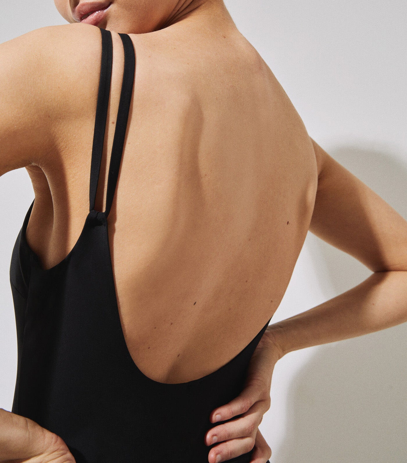 Shaping Swimsuit With Grommet Black
