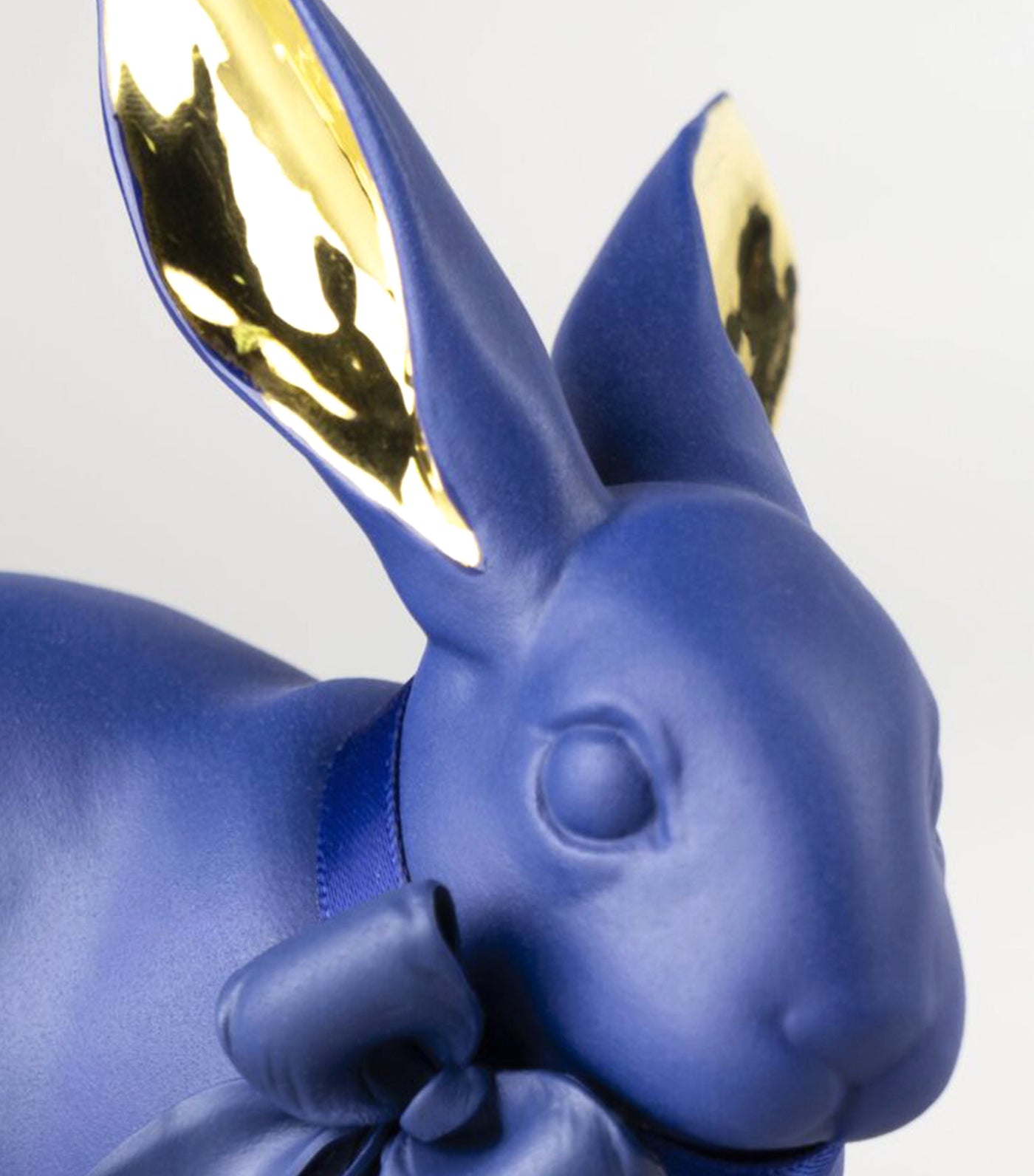 lladro blue-gold attentive bunny figurine